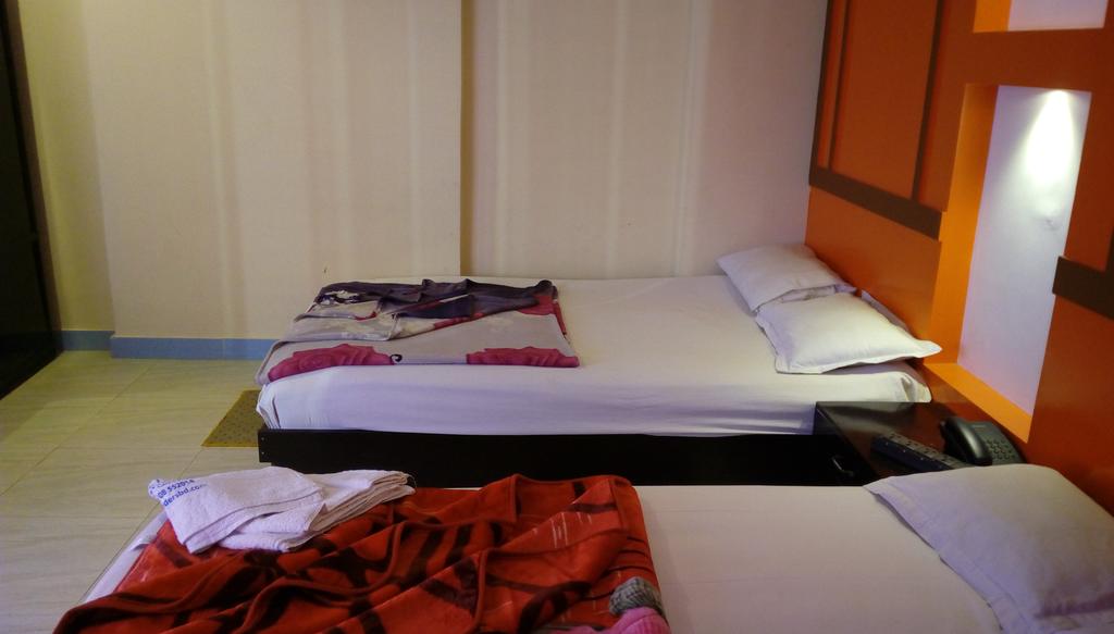 Deluxe Quad Room