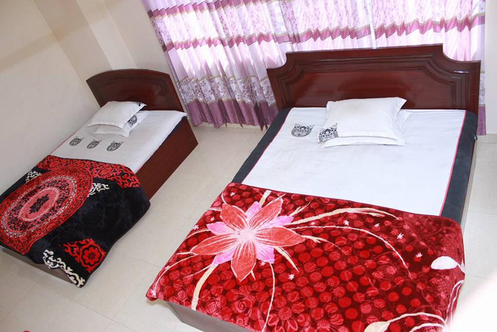 Economy Quad Room